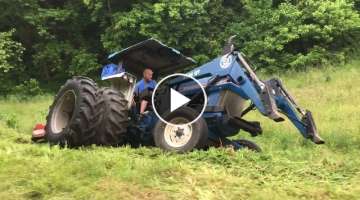 Extreme bush hogging steep ground on a rear wheel drive tractor