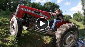 Mowing steep Pasture with a 2 wheel drive Massey Ferguson!