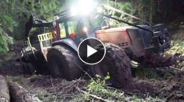 Valtra forestry tractor logging in the hills, difficult conditions